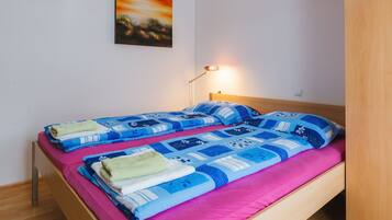 Appartement, 1 slaapkamer, balkon | Verduisterende gordijnen, gratis babybedden, gratis wifi, beddengoed