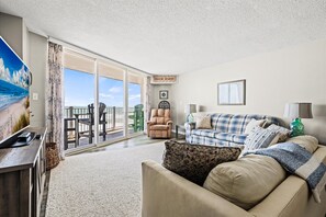 Flat-screen TV - Oceanfront Retreat | Balcony Views & Resort Pool (N Topsail Beach)