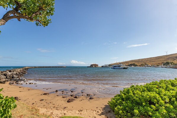 On the beach, sun-loungers, beach towels