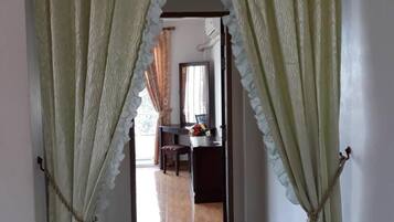 Blackout drapes, WiFi (free), bed sheets
