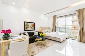 Studio Apartment | Living area | 50-inch Smart TV with cable channels, TV