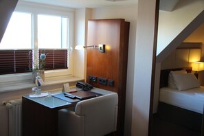 Hypo-allergenic bedding, pillow-top beds, in-room safe, desk