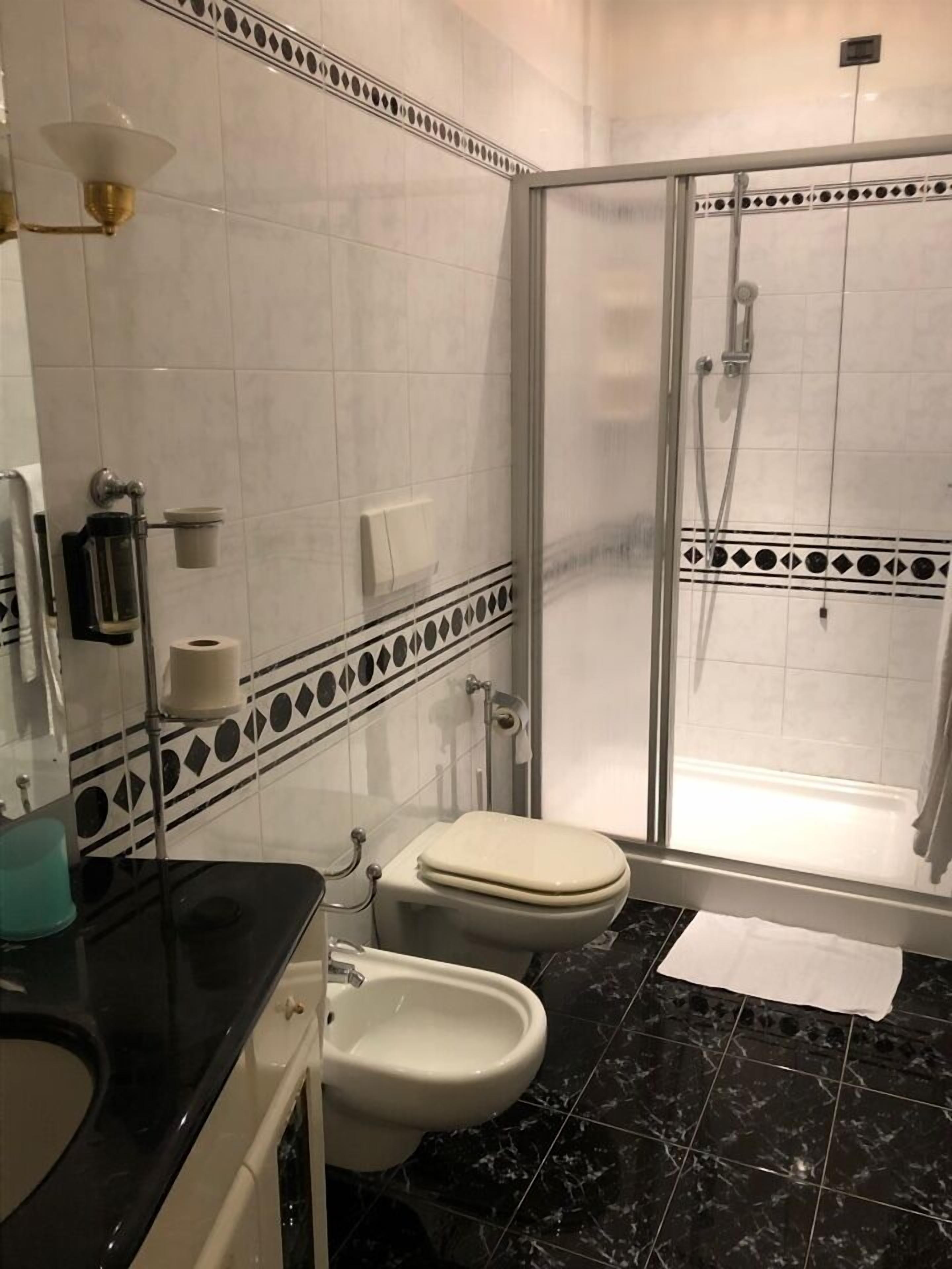 shower, free toiletries, hair dryer, slippers