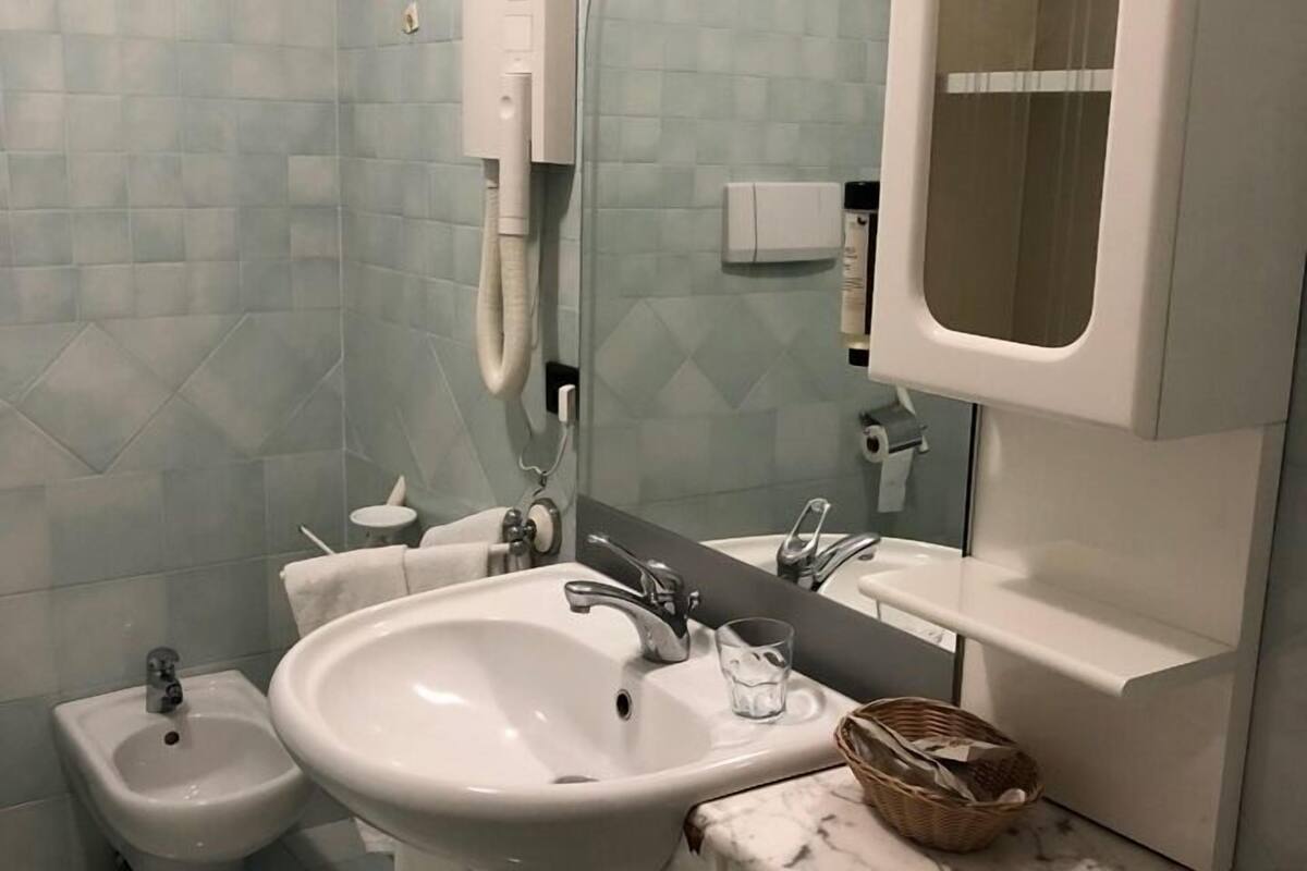 single room | bathroom | shower, free toiletries, hair dryer, slippers