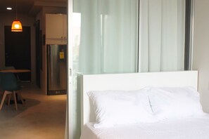 Laptop workspace, free WiFi, bed sheets