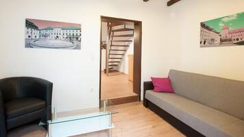 Apartamento familiar | Sala de estar | Una televisión de pantalla plana