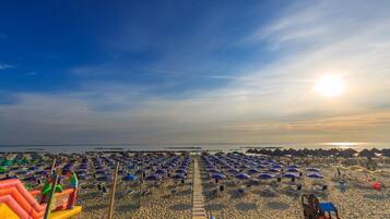 Private beach, sun loungers, beach umbrellas, beach towels