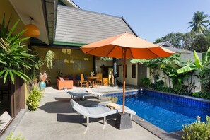 Outdoor pool, pool umbrellas, pool loungers