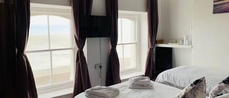 Blackout curtains, iron/ironing board, free WiFi, bed sheets