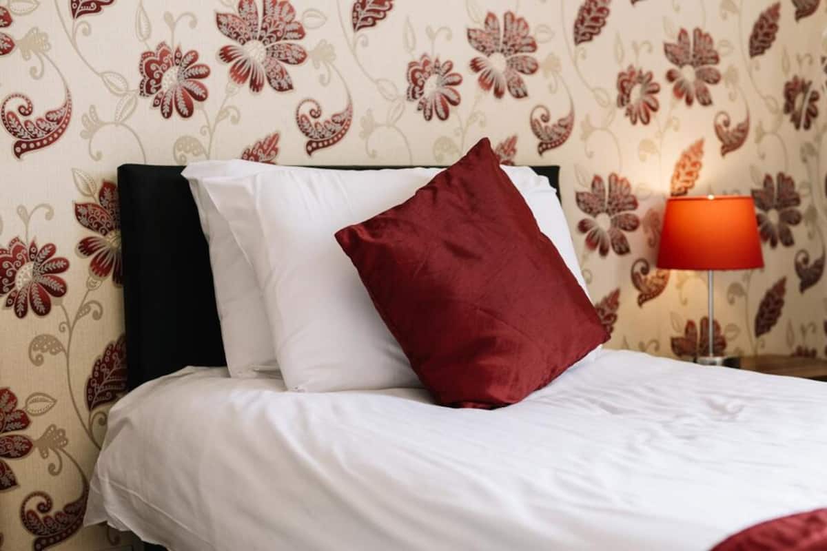 Blackout curtains, iron/ironing board, free WiFi, bed sheets