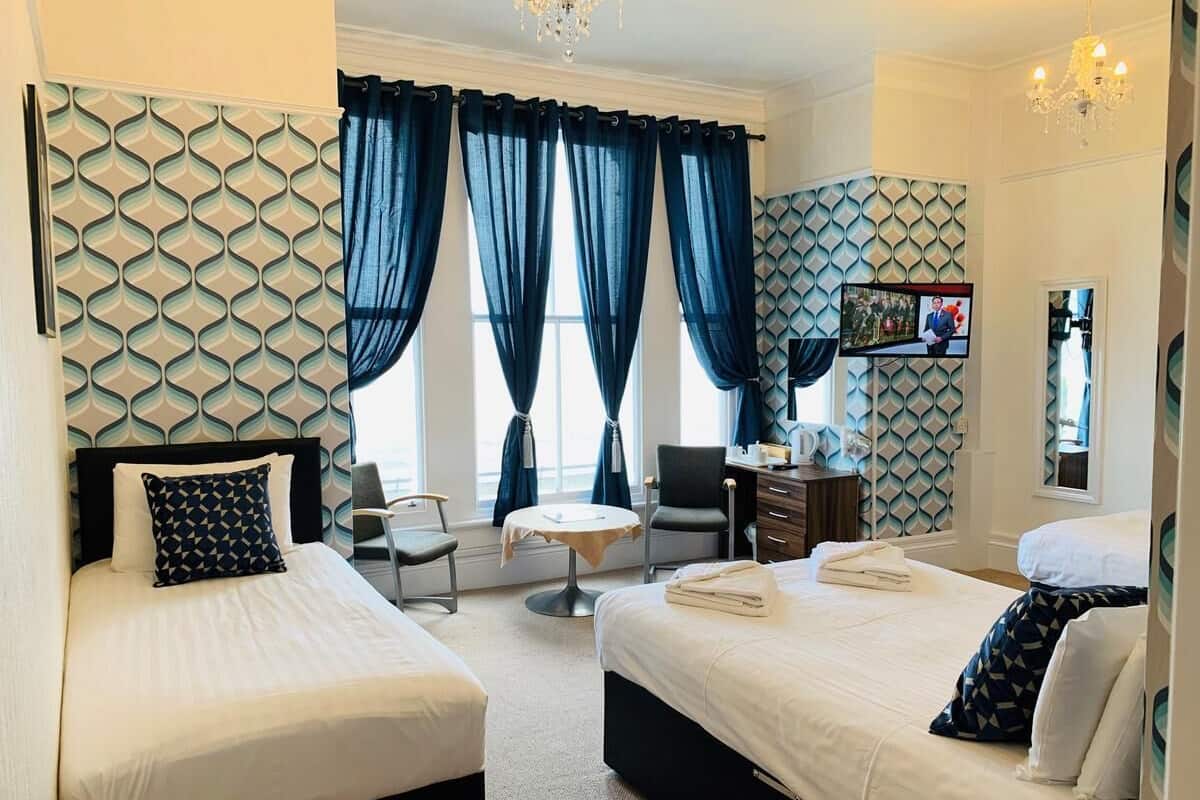 Family Room, Sea View | Blackout curtains, iron/ironing board, free WiFi, bed sheets