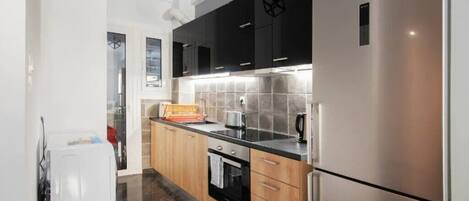 Forn, cafetera i tetera i torradora