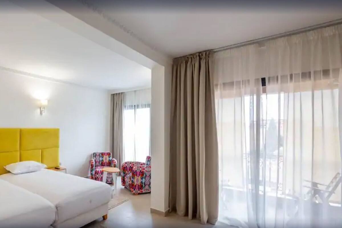 Superior Room, Balcony | Minibar, in-room safe, desk, laptop workspace