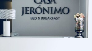 A wall with the text "CASA JERÓNIMO BED & BREAKFAST" indicating a bed and breakfast establishment. - Casa Jerónimo B&B (Lamego)