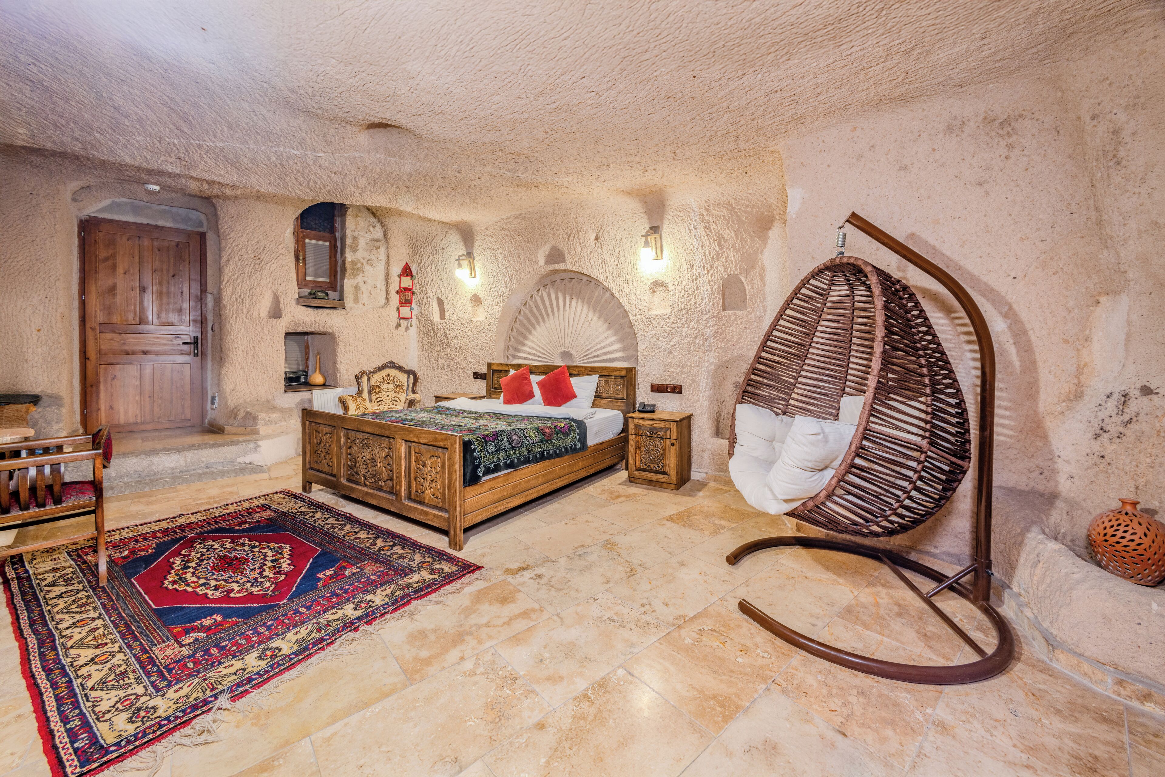 cave room, jacuzzi | 1 bedroom, egyptian cotton sheets, premium bedding, minibar