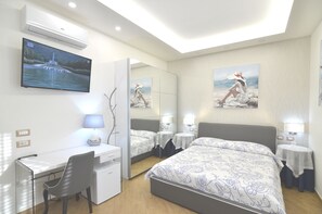 1 chambre, coffres-forts dans les chambres, fer et planche à repasser