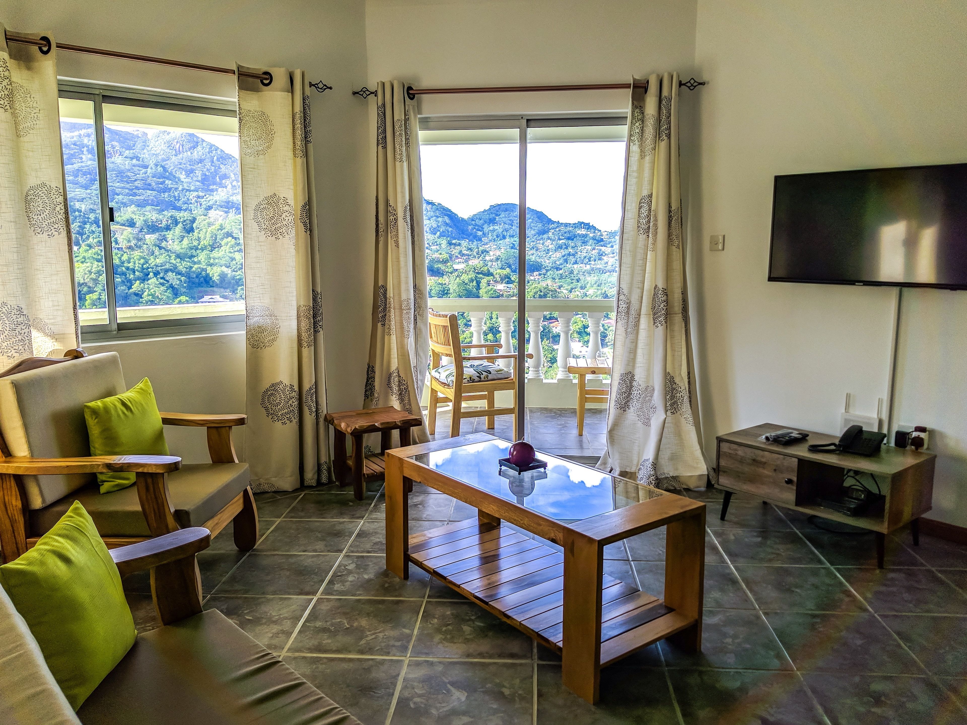 Félicité | Living area | 32-inch Smart TV with satellite channels, TV
