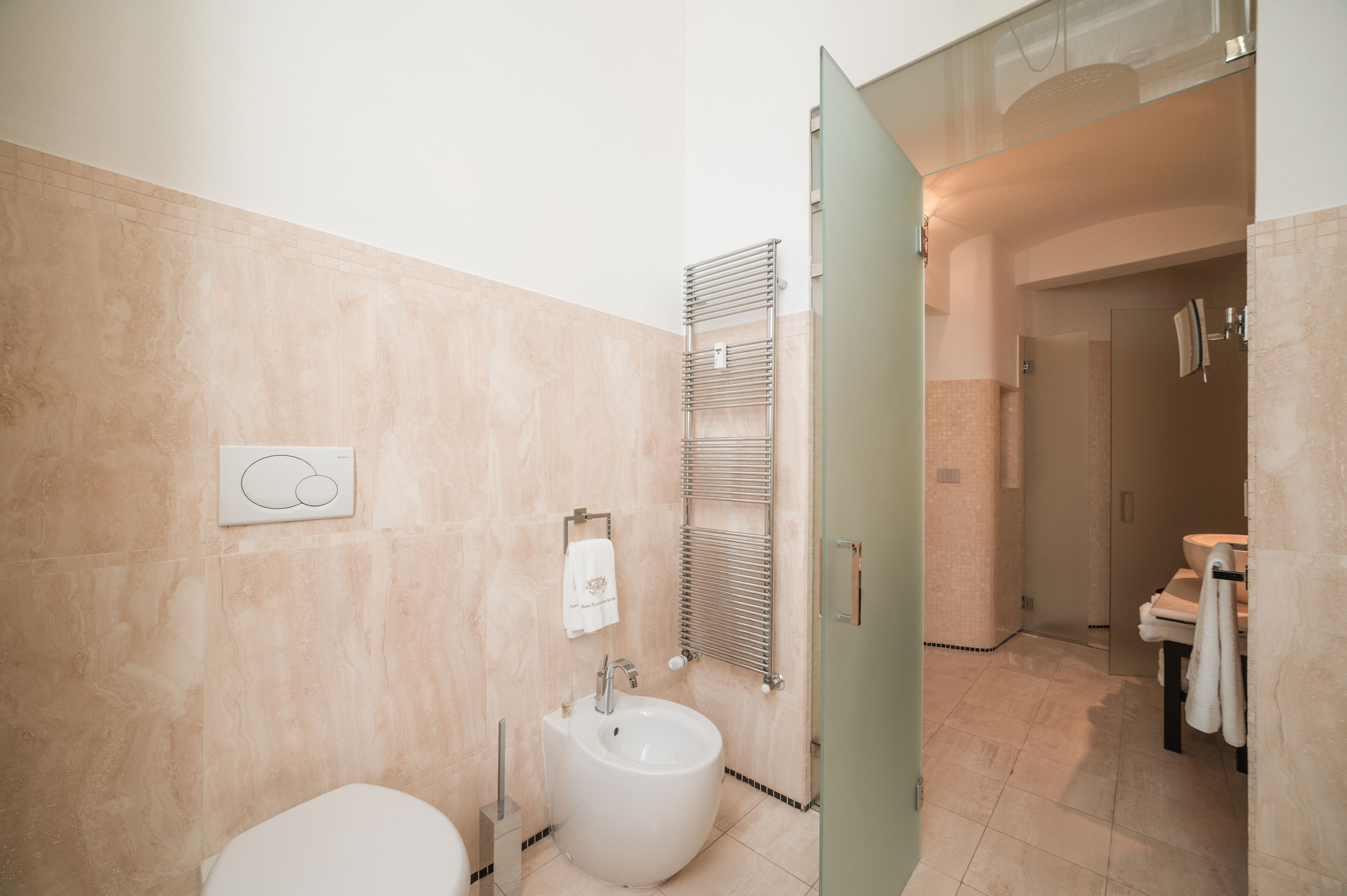 junior suite | bathroom | designer toiletries, hair dryer, bathrobes, slippers