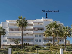 A multi-story building with an Attic Apartment indicated by an arrow. - Penthouse with panoramic views Los Alamos (Torremolinos)