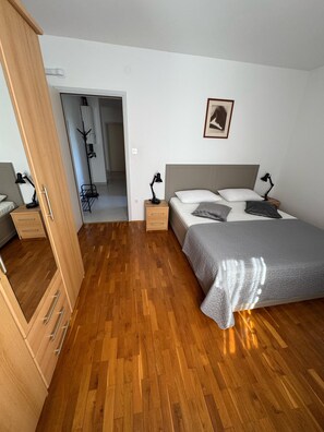 Superior Apartment | Down comforters, individually furnished, desk, free WiFi