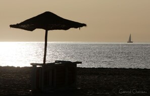 A la platja, gandules de platja i tovalloles de platja