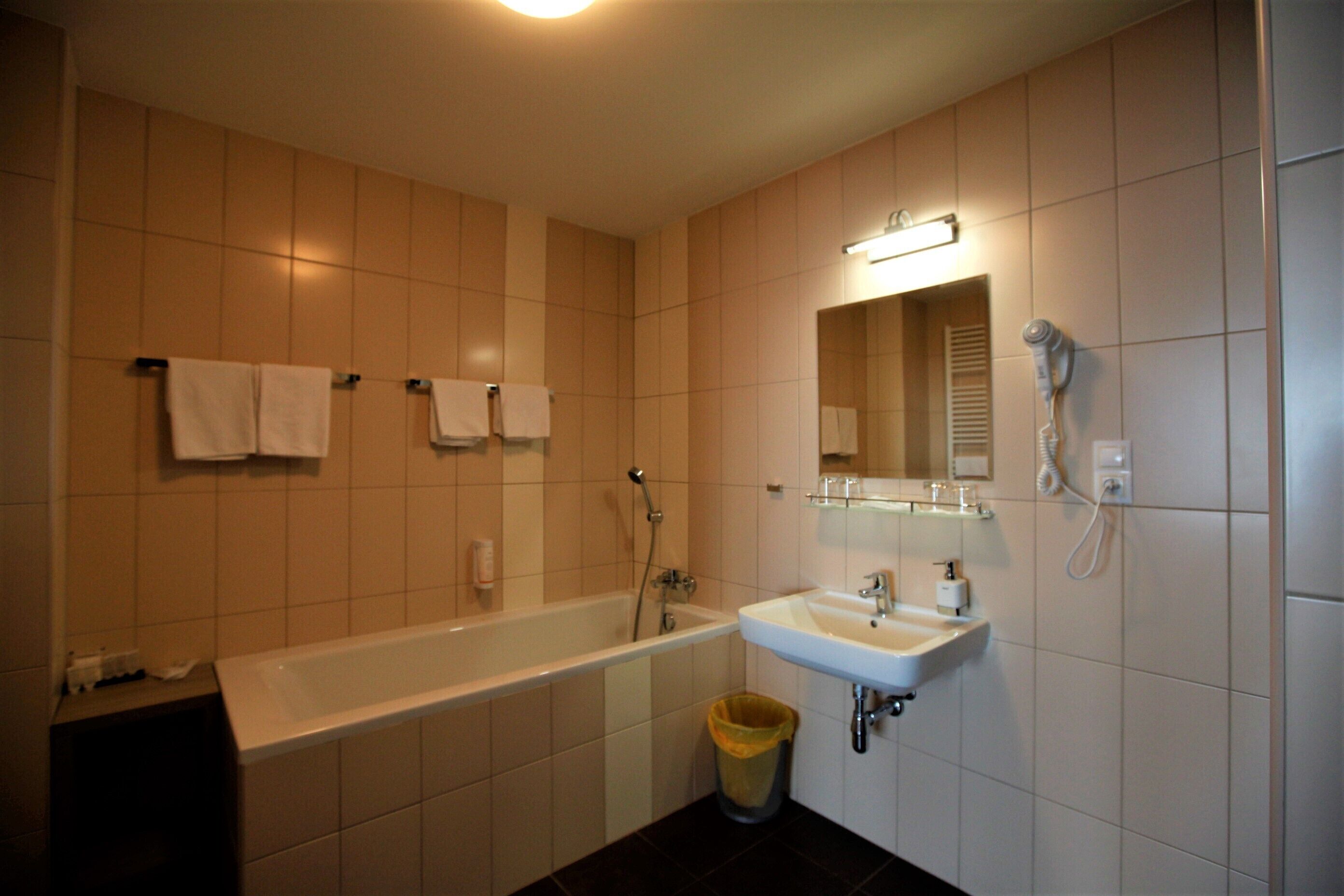 deluxe quadruple room, 2 queen beds | deep-soaking bathtub