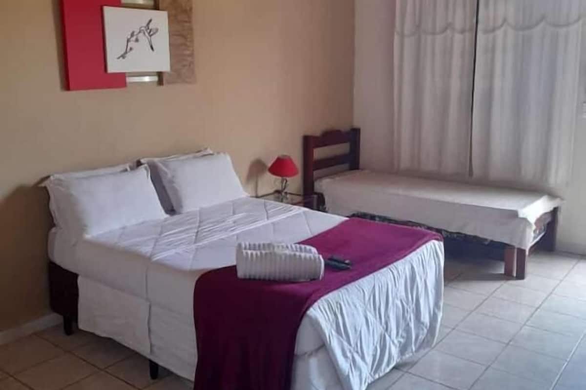 Family Quadruple Room | Minibar, free WiFi, bed sheets