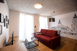 Apartament de disseny, 1 dormitori (2) | Sala d'estar | Televisor de pantalla plana 