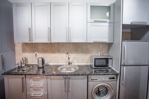 Apartment, Balcony | Private kitchen