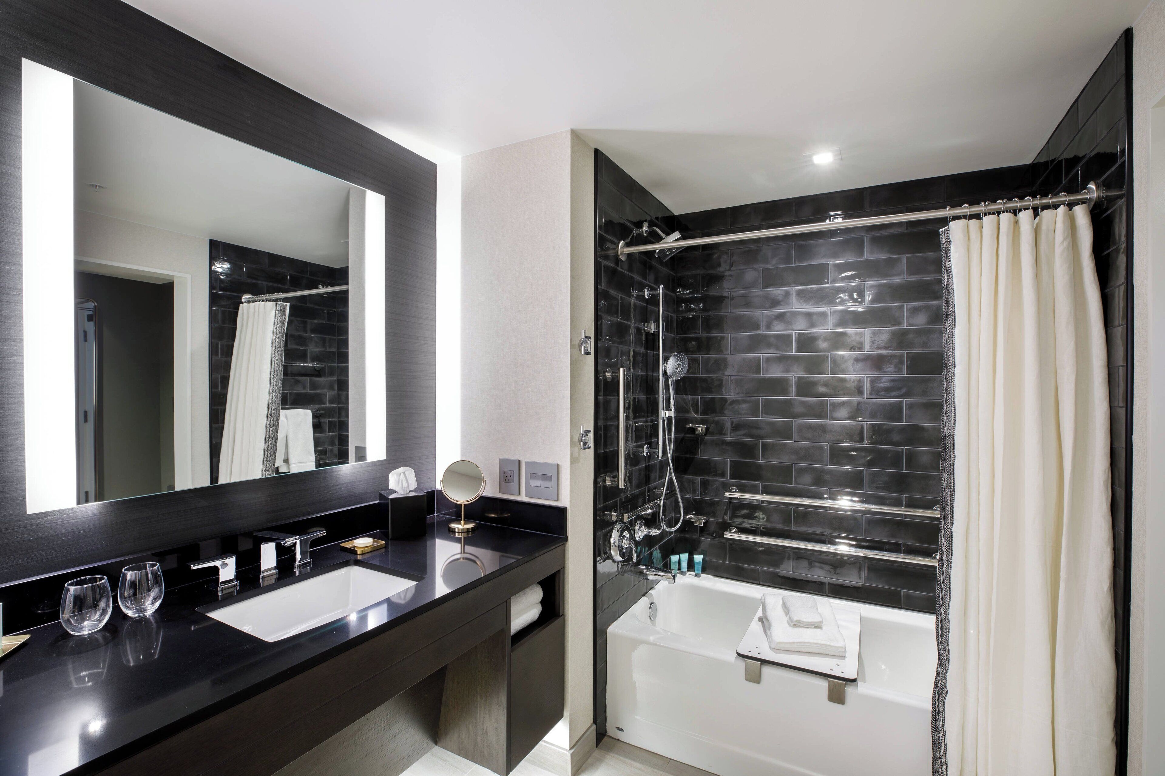 deluxe room, 1 king bed | bathroom | shower, designer toiletries, hair dryer, bathrobes