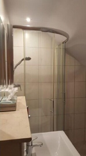 Shower, towels, soap, shampoo
