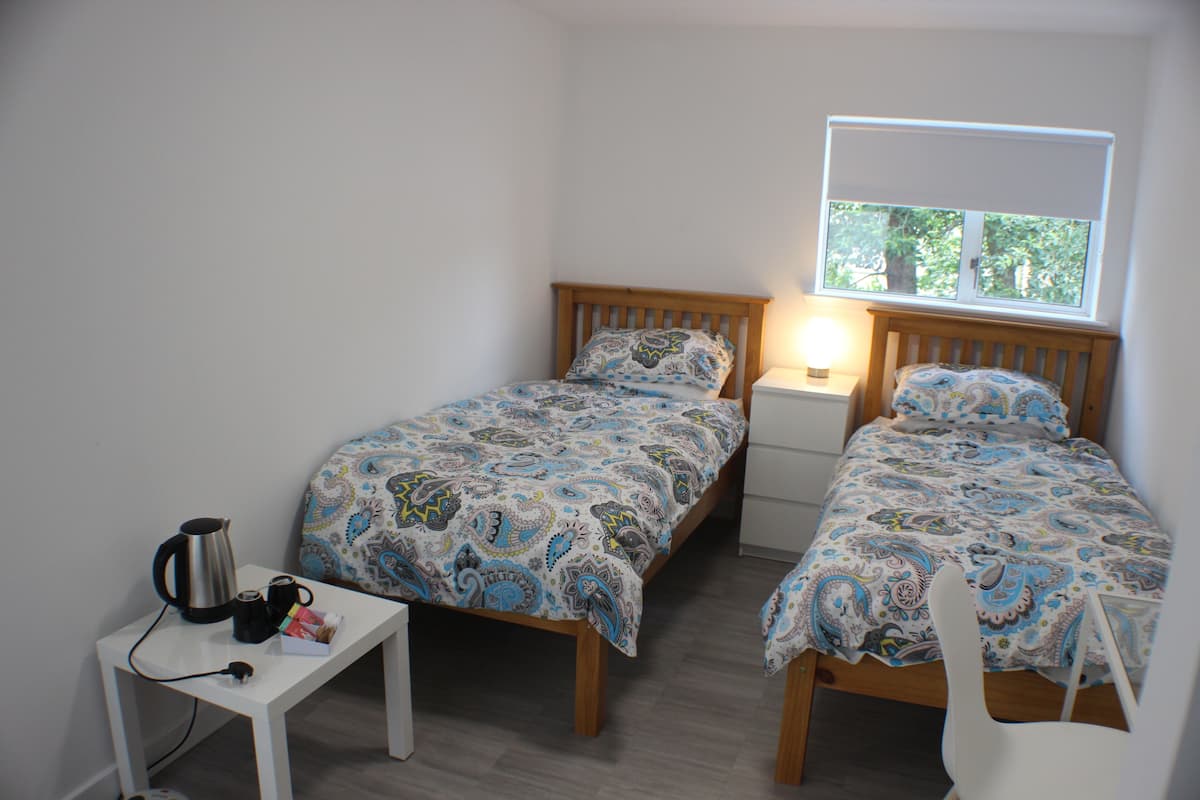 Quarto duplo, suíte | Roupa de cama