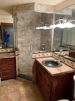 Combined shower/tub, hair dryer, towels, toilet paper