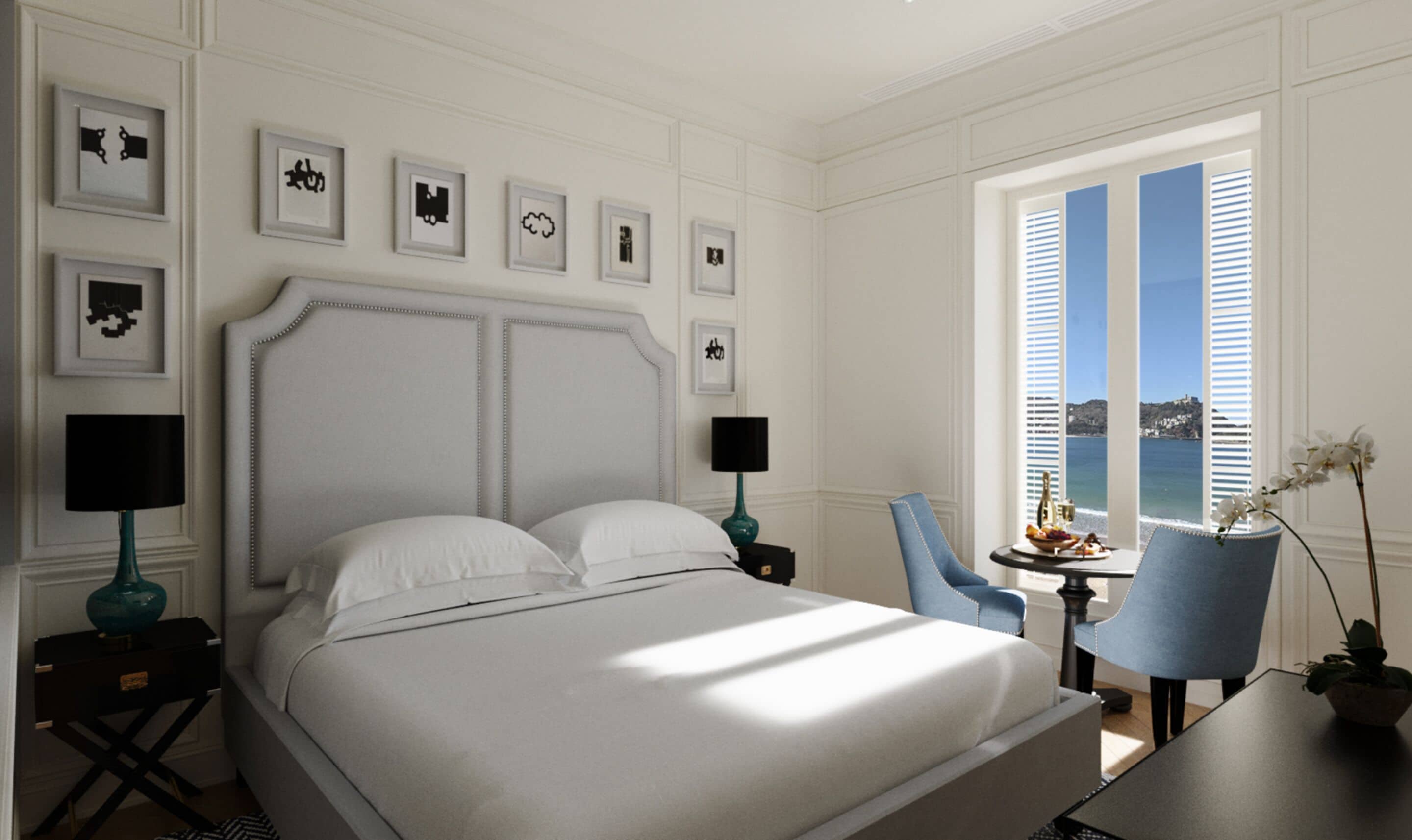 A neatly arranged bedroom with a large bed, two bedside tables with lamps, a chair, and a view of the sea through a window with shutters.