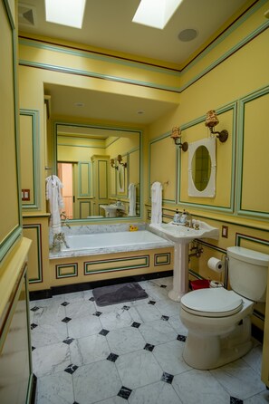 Bathtub, hair dryer, towels, soap