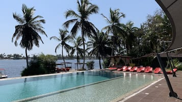 2 outdoor pools, pool umbrellas, pool loungers