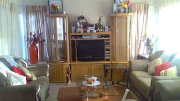 35-inch flat-screen TV with cable channels, TV
