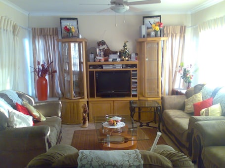 35-inch flat-screen TV with cable channels, TV