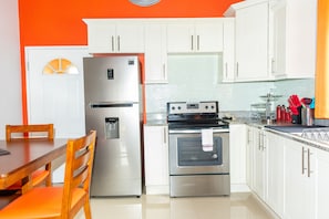 Family Villa, Multiple Beds, Non Smoking | Private kitchen | Full-sized fridge, microwave, oven, stovetop