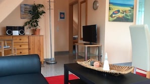 Apartamento (1) | Zona de estar | Una televisión de pantalla plana