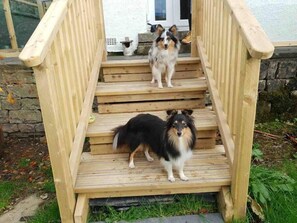 A wooden staircase leading to a house entrance. - Hillgarth, Underbarrow, The Lake District (Underbarrow)