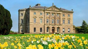 A large, historic building with a symmetrical facade, multiple windows, and a central entrance. - Stunning 5 star church conversion, Strangford, Co Down (Downpatrick)