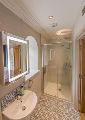 Bathtub, hair dryer, towels, soap