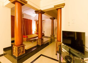 Habitación superior | Zona de estar