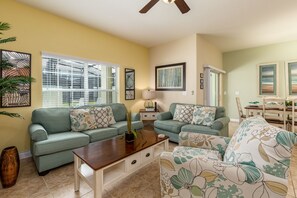 Townhome, 4 Bedrooms (3 Bathrooms) | Living area | 55-inch flat-screen TV with cable channels, LED TV, DVD player