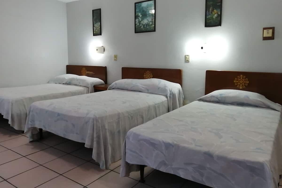 Standard Triple Room | Iron/ironing board, free WiFi, bed sheets
