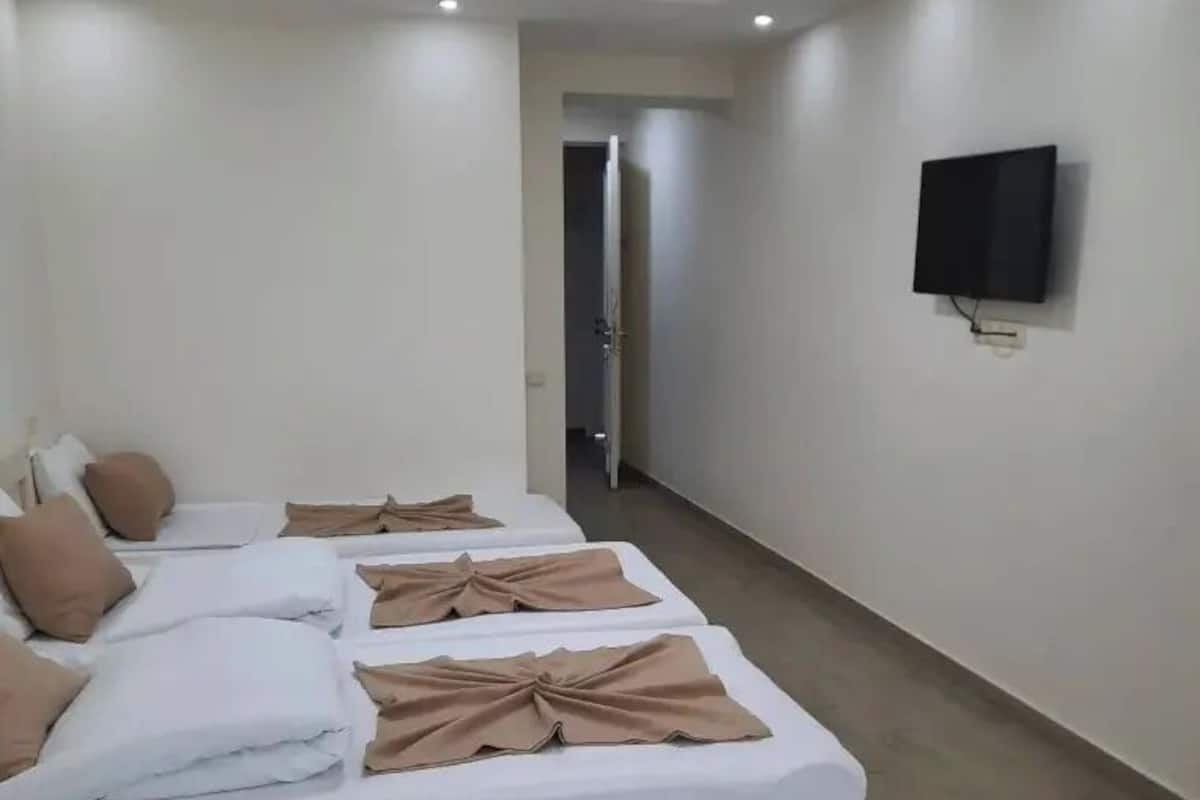 Premium bedding, blackout curtains, soundproofing, free WiFi