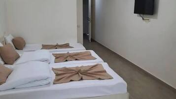 Premium bedding, blackout curtains, soundproofing, free WiFi