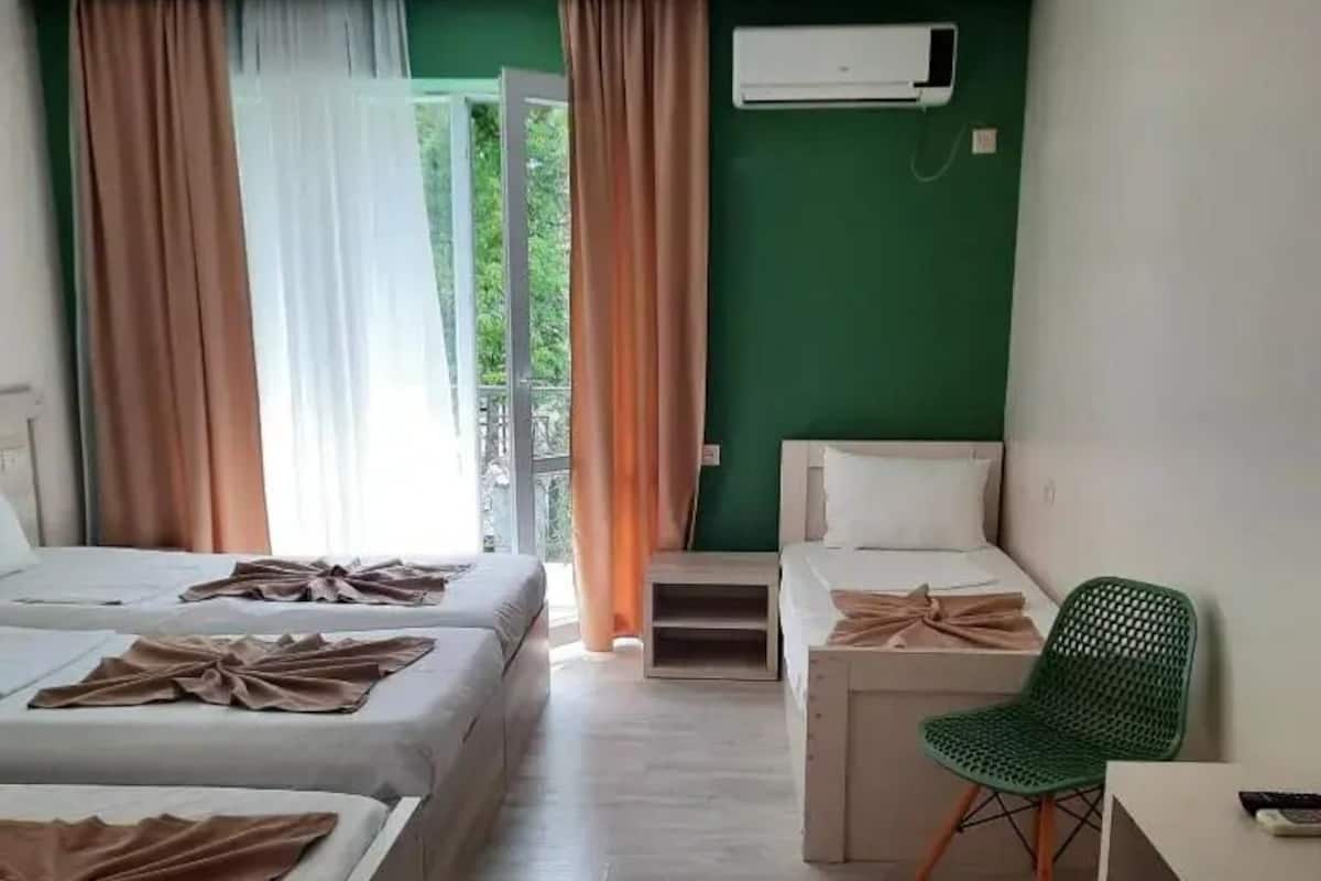 Premium bedding, blackout curtains, soundproofing, free WiFi