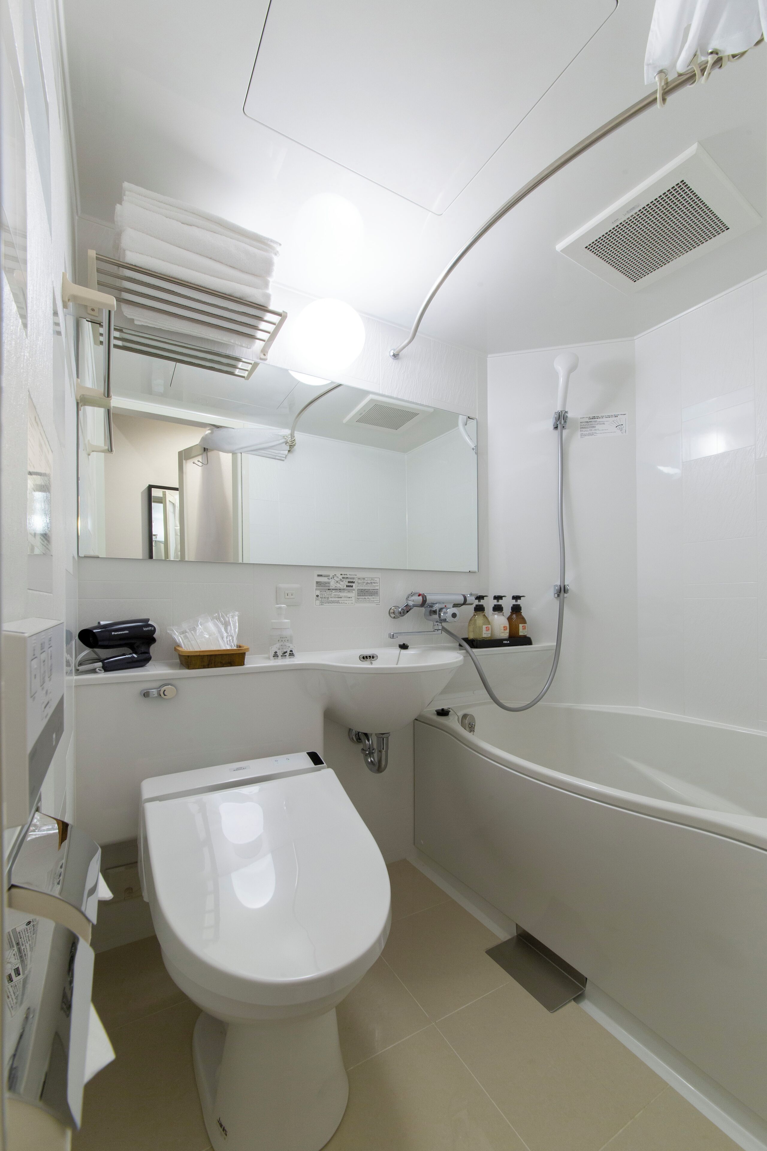 Combined shower/tub, hair dryer, bathrobes, slippers